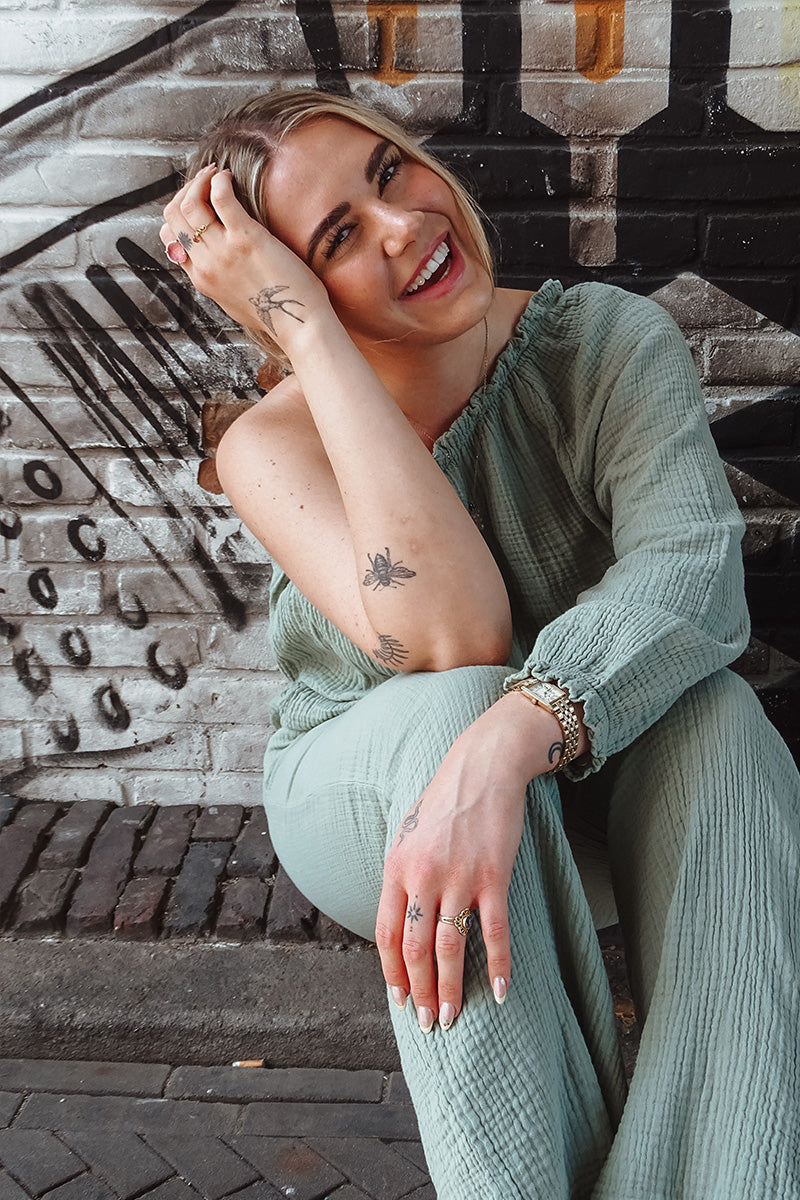 Lichtgroene one shoulder jumpsuit